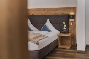 Voodi või voodid majutusasutuse Hotel Ferienglück toas