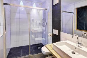 Vannituba majutusasutuses Hotel Ferienglück