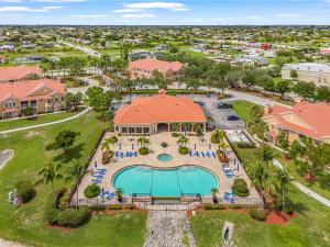 an aerial view of a resort property with a swimming pool at Peaceful and Relaxing Community - Peace of Cape - Roelens in Cape Coral