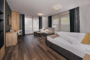 Voodi või voodid majutusasutuse Hotel Ferienglück toas