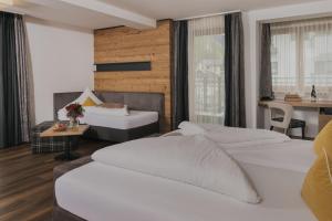 Voodi või voodid majutusasutuse Hotel Ferienglück toas