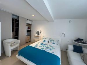 Postel nebo postele na pokoji v ubytování COTTAGE MARIN avec VUE MER