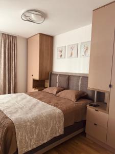 Ένα ή περισσότερα κρεβάτια σε δωμάτιο στο Feel apartments