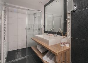 Vannituba majutusasutuses Hotel Ferienglück