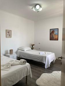 Postel nebo postele na pokoji v ubytování MAin Apartment