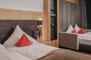 Voodi või voodid majutusasutuse Hotel Ferienglück toas