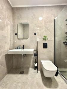 Koupelna v ubytování Sunny Bay Apartments