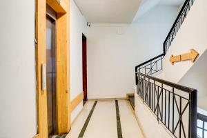 Fotografie z fotogalerie ubytování Townhouse Oak Gravity Inn v destinaci Puné