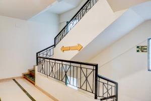 Fotografie z fotogalerie ubytování Townhouse Oak Gravity Inn v destinaci Puné