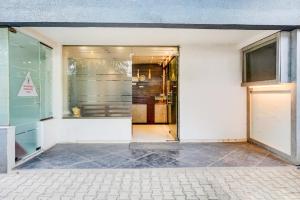 Fotografie z fotogalerie ubytování Townhouse Oak Gravity Inn v destinaci Puné