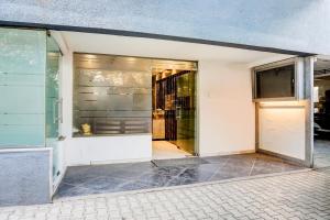 Fotografie z fotogalerie ubytování Townhouse Oak Gravity Inn v destinaci Puné