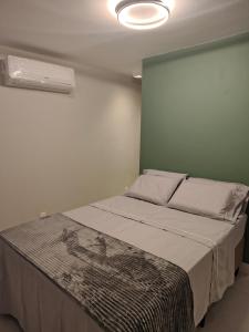 Postel nebo postele na pokoji v ubytování Loft Torres