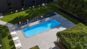 Bazén v ubytování Lielupe Hotel SPA & Conferences by Semarah nebo v jeho okolí