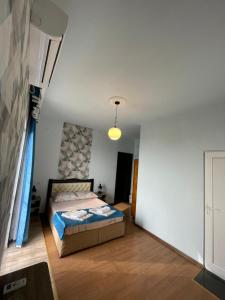 Letto o letti in una camera di Tsisa House