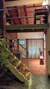 En balkon eller terrasse på La Casa del Paraná - San Pedro