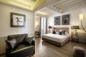 Posteľ alebo postele v izbe v ubytovaní Condotti Palace + 20 fotografií
