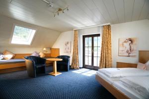 Postel nebo postele na pokoji v ubytování Hotel Waldblick