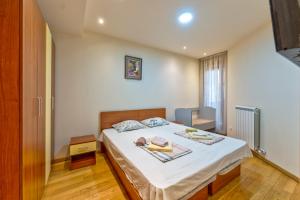 Giường trong phòng chung tại Kalman Dunja