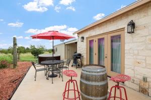 En terrasse eller udendørsområde på Pecan Farm Garden Haus