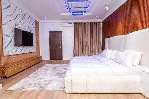 Ένα ή περισσότερα κρεβάτια σε δωμάτιο στο Oyster Shell Apartments