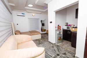 Η κουζίνα ή μικρή κουζίνα στο Oyster Shell Apartments