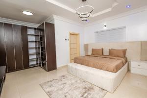 Ένα ή περισσότερα κρεβάτια σε δωμάτιο στο Oyster Shell Apartments