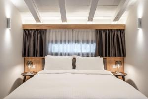 Posteľ alebo postele v izbe v ubytovaní Hotel Lajadira & Spa