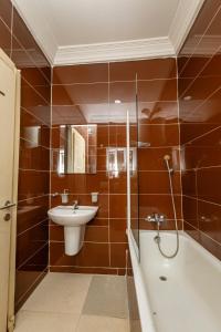 Ένα μπάνιο στο Oyster Shell Apartments +24 φωτογραφίες