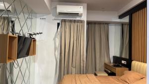 Φωτογραφία από το άλμπουμ του Delft Apartment CPI σε Tanjungbunga +2 φωτογραφίες
