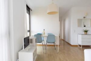 Posezení v ubytování Bright Apartment In Gava Mar