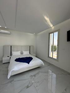 Ένα ή περισσότερα κρεβάτια σε δωμάτιο στο Villa Alyah