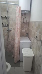 Koupelna v ubytování Apartman Laura + 26 fotografií