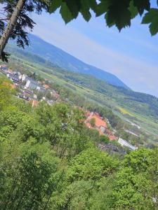 a view of a town in a valley with mountains at Lubawskie Zacisze in Lubawka +6 photos