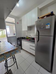 Η κουζίνα ή μικρή κουζίνα στο Apt 8 min do centro de Piracicaba, 30 min Thermas São Pedro