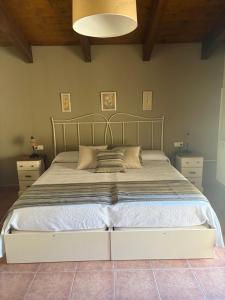 Postel nebo postele na pokoji v ubytování Hotel Guara Inlukā