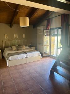 Postel nebo postele na pokoji v ubytování Hotel Guara Inlukā