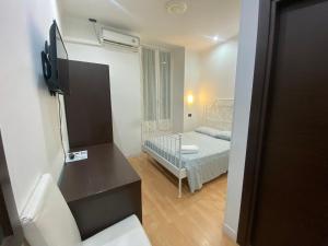 Posteľ alebo postele v izbe v ubytovaní Memole Inn Sanremo