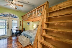 a bedroom with a loft bed and a staircase at Poolside Relaxation Resort Condo in Naples! in Naples +25 photos
