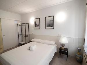 Postel nebo postele na pokoji v ubytování L'Hostalet GuestHouse