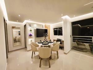 a dining room with a table and chairs at Luxury apartment with sea view in Cartagena de Indias