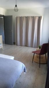 Postel nebo postele na pokoji v ubytování Gîte des Sagards
