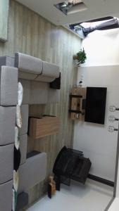 TV a/nebo společenská místnost v ubytování Gîte des Sagards