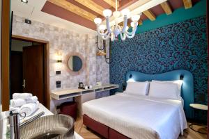 Postel nebo postele na pokoji v ubytování Hotel Ca' D'Oro - WENICE Deep Culture