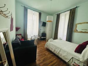 A bed or beds in a room at Affittacamere Firenze in Libertà Parterre