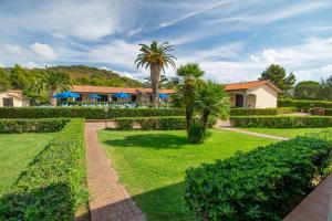 A garden outside Lido Azzurro Residence rta
