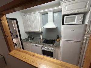 Kuchyň nebo kuchyňský kout v ubytování Apartamento Zahara de los Atunes- Atlanterra Costa