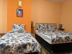 Ένα ή περισσότερα κρεβάτια σε δωμάτιο στο Апартамент Аладин- Център Враца