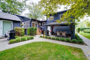 an exterior view of a house with a patio at The Beach House - Steps To Beach Area 3 4br in Wasaga Beach