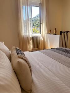 Postel nebo postele na pokoji v ubytování Angoli di pace - Duplex