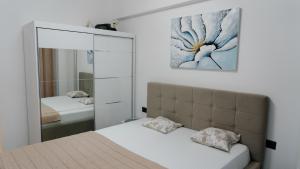 Un pat sau paturi într-o cameră la Sea Paradise - Odyssey Pool & Spa Resort +55 fotografii